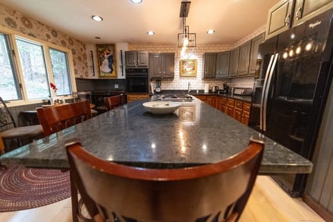 Kitchen Island w/ fire burner gas cooktop
original artwork, too!