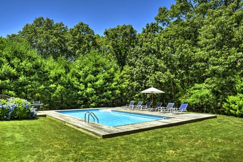 Spacious, sunlit pool area with private, professionally landscaped grounds.