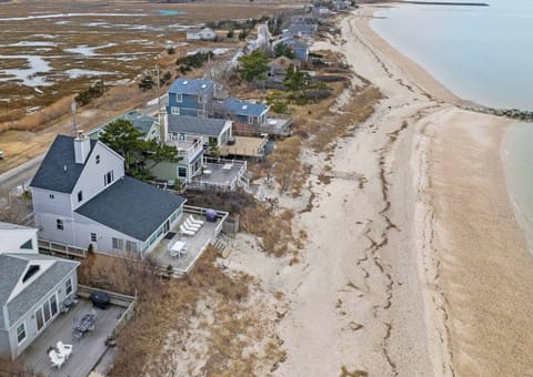 Aerial view of Soundview Beach House, directly on the bay.