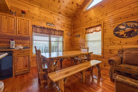 Beautiful log dining table with 2 extra seats at the kitchen bar