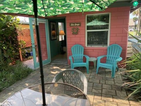 The lush front patio leading to the Sea Grape cottage.   