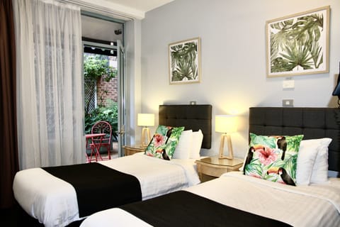 Twin Room | Premium bedding, in-room safe, desk, blackout drapes