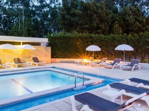 Seasonal outdoor pool, pool umbrellas, sun loungers