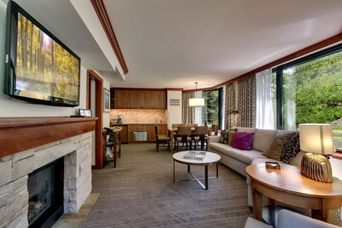 Kitchen dining, living rm w/ a stone fireplace. So much room. Newly Remodeled!