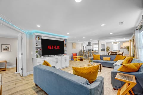 Living room with 75 inch TV perfect for movie nights 