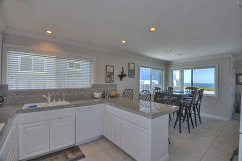 full kitchen offering all utensils and cook wear, spices