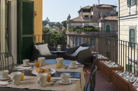 The terrace with wonderful view on Saint Peter and Trastevere roofs 