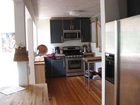 open kitchen overlooking dining area for easy buffet and clean up