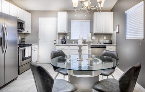 Dining table and seating for four.