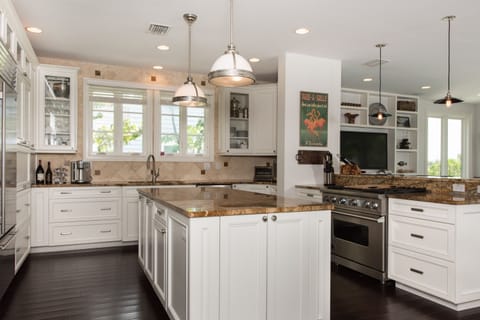 Newly remodeled kitchen with granite and Viking stove and Sub Zero Fridge.