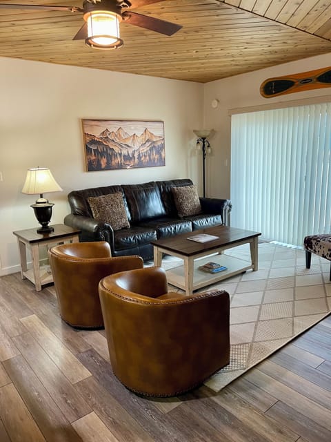 Spacious living area with views of the mountains through the sliding glass doors