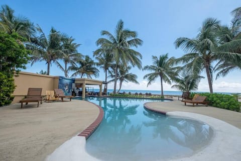 Great pool with swim-up bar. Cocktails in the pool with the Ocean as your view