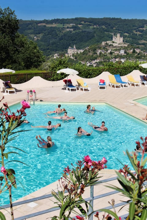 Indoor pool, outdoor pool, pool umbrellas, sun loungers
