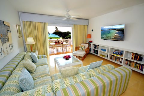 Relax on our large couch and look at the sea, or watch our 55 inch HDTV