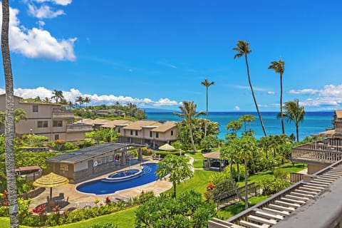 View from the lanai - Stunning views of the lush tropical landscaping and the ocean