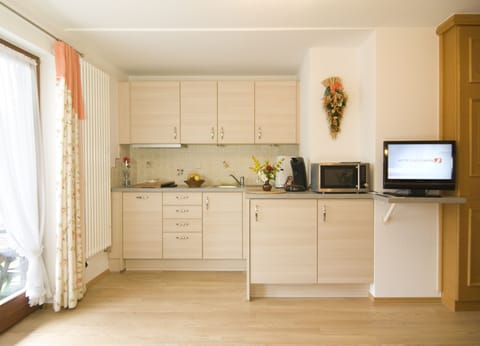 Apartment, 2 Bedrooms, Balcony | Private kitchen | Full-size fridge, microwave, stovetop, dishwasher
