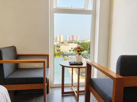 Deluxe Double Room, City View | Minibar, desk, WiFi (free), bed sheets