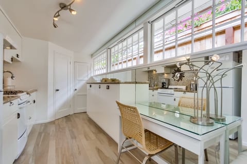 Light and bright with extra cabinets for storage.