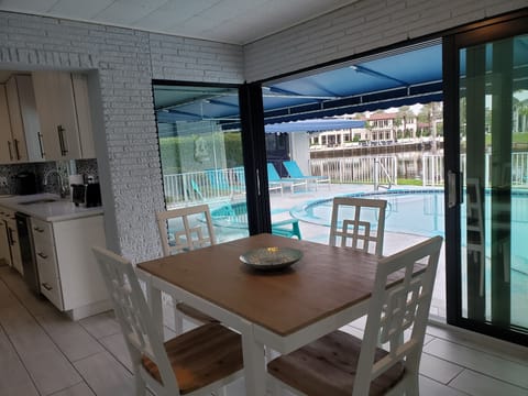 Open breakfast area with panoramic glass views