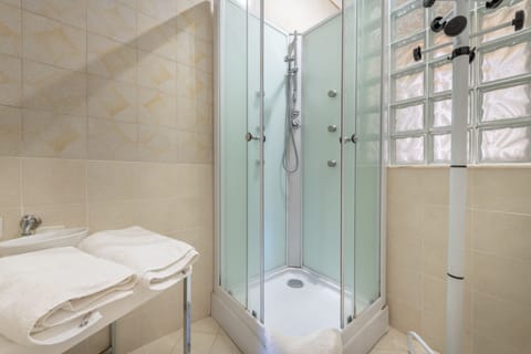 Deluxe Double Room | Bathroom | Deep soaking tub, hair dryer, bidet, towels