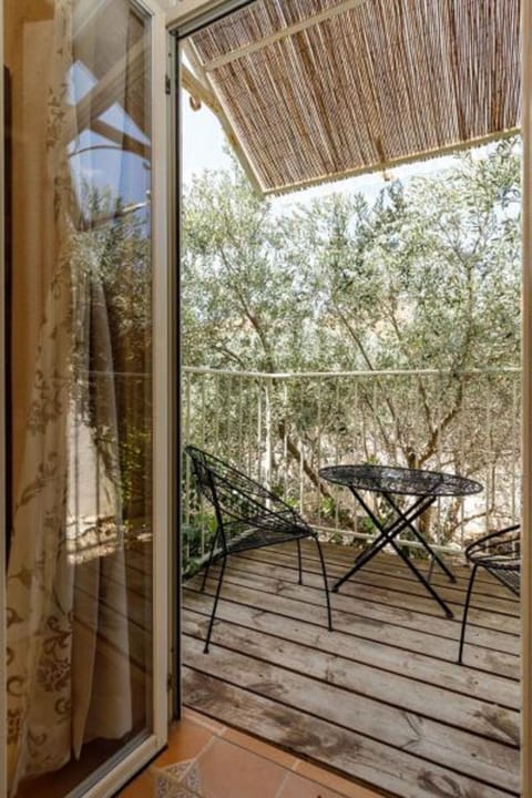 Suite, 1 Queen Bed, Non Smoking | Balcony