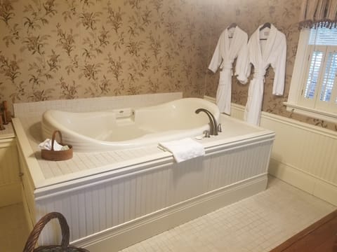 The Carriage House Suite | Individually decorated, individually furnished, blackout drapes