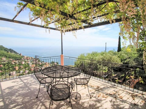 Table, Furniture, Property, Plant, Blue, Chair, Tableware, Shade, Interior Design, Outdoor Furniture
