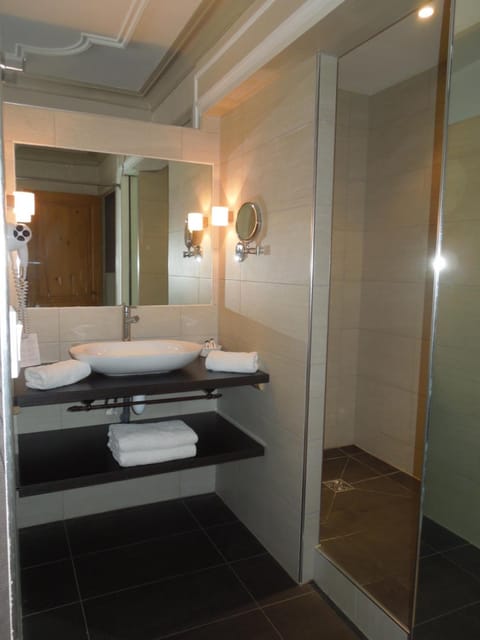 Deep soaking tub, rainfall showerhead, free toiletries, hair dryer