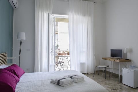Double Room, Private Bathroom (not in room) | Minibar, desk, free WiFi, bed sheets