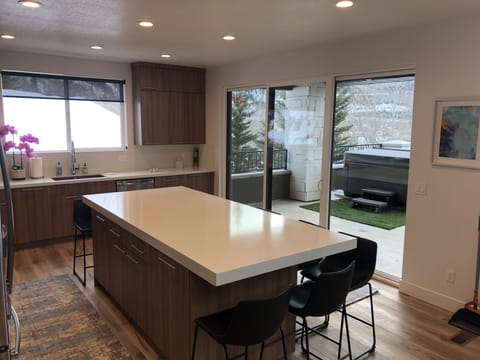 Deck with Hot Tub off of Kitchen.