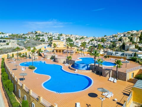 Sky, Water, Property, Swimming Pool, Nature, Azure, Building, Body Of Water, Tree, Urban Design