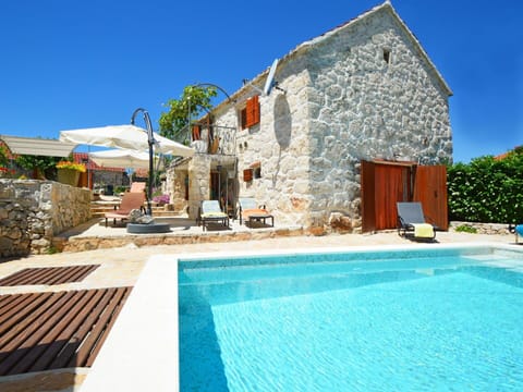 Sky, Water, Plant, Property, Building, Swimming Pool, Azure, Shade, Outdoor Furniture, Chair
