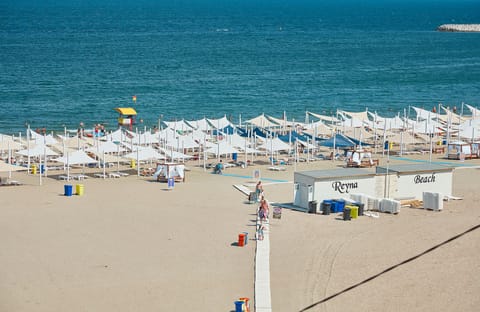 Private beach nearby, 5 beach bars