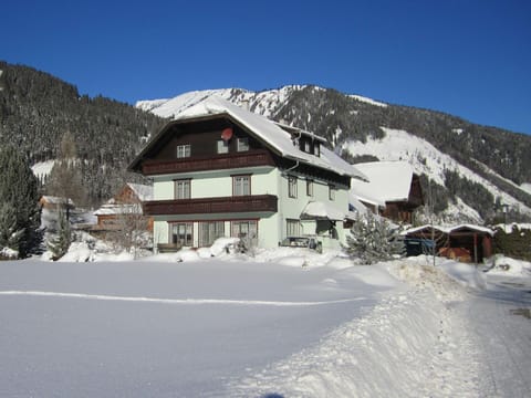 Sky, Snow, Mountain, Property, Window, Building, House, Slope, Tree, Mountainous Landforms