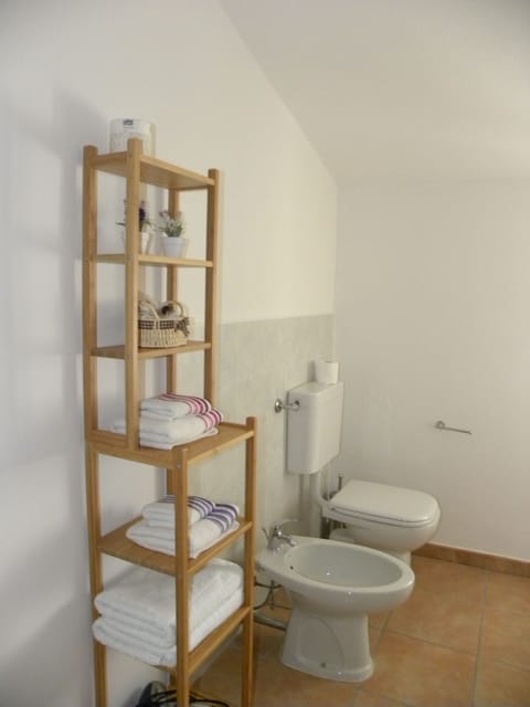 Quadruple Room, 2 Bathrooms | Bathroom amenities | Shower, free toiletries, hair dryer, bidet