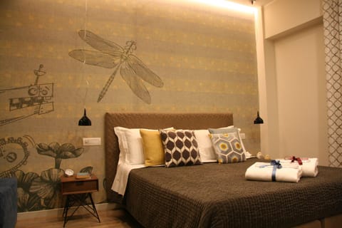 Triple Room (1) | Free minibar items, in-room safe, desk, iron/ironing board