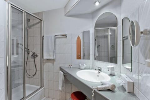 Shower, free toiletries, hair dryer, slippers