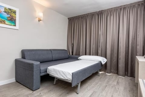 Blackout drapes, iron/ironing board, free WiFi, bed sheets