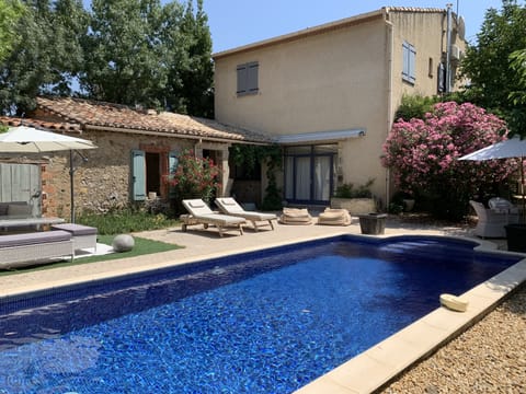View of pool, house and garden