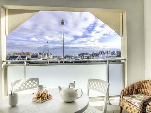 Tableware, Table, Cloud, Property, Furniture, Sky, Building, Food, Chair, Dishware