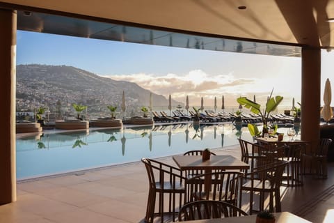 Indoor pool, outdoor pool, pool umbrellas, sun loungers