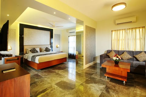 Suite, 1 King Bed | Minibar, in-room safe, individually furnished, rollaway beds