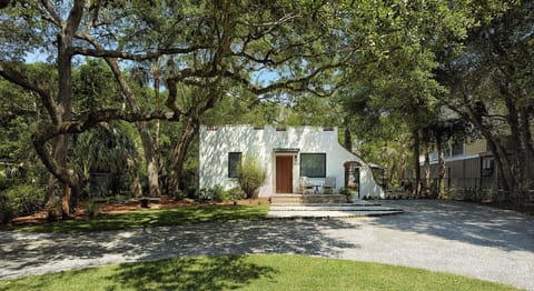 Beautifully and respectfully renovated vintage home with oak trees and fantastic landscaping.