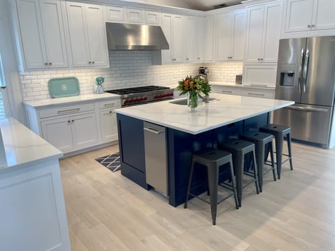 Brand new kitchen with gourmet Wolf range. 