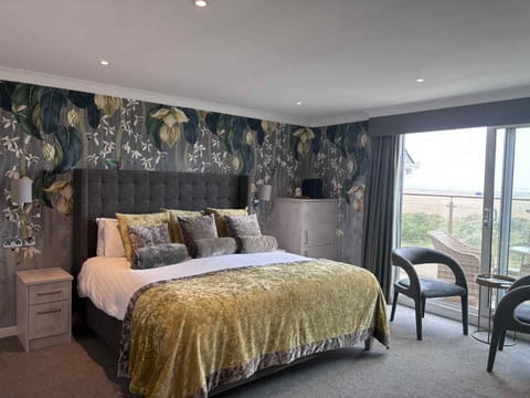 Panoramic Quadruple Room, Sea View | Desk, laptop workspace, iron/ironing board, free WiFi