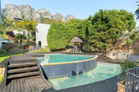 Outdoor pool, pool umbrellas, sun loungers