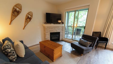 Open concept living area with gas fireplace