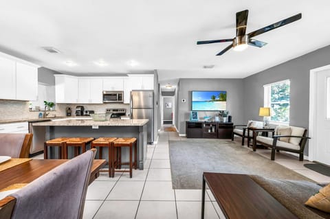 Enjoy 5 seating areas! 4 bar stools, dining for 6, 2 chairs, or 4 stools!