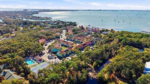 PRIVATE Beach Access | 2 Pools | vibrant waterfront resort community known for its colorful coastal architecture, private beach access, and resort style amenities. Located near the sand and surrounded by water views!