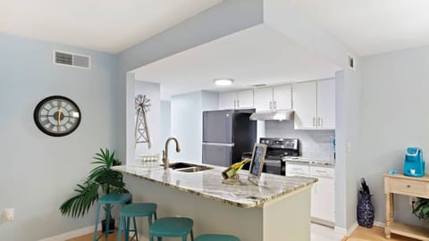 Mingle with friends and family and you gather around your beautiful kitchen